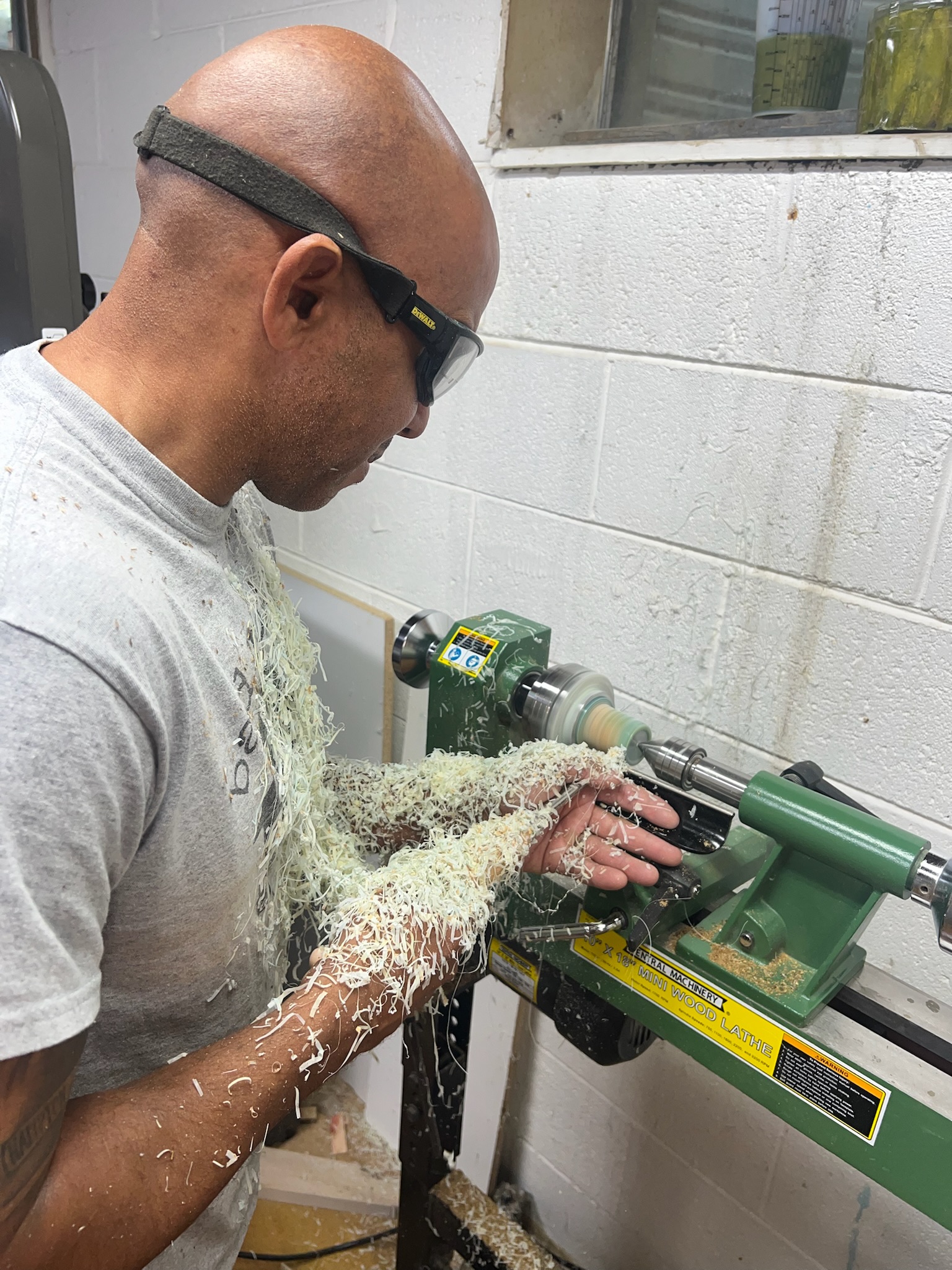 Michael Mauricio (Founder) working on a bottle stopper